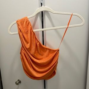 Gorgeous orange top. Sizes small. Stretchy material